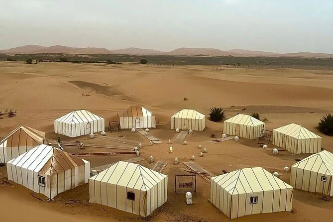 3 Day Desert Tour From Marrakech To Merzouga Dunes - Day 1: High Atlas views, Ait Benhaddou, Ouarzazate, and a Rose Valley overnight
