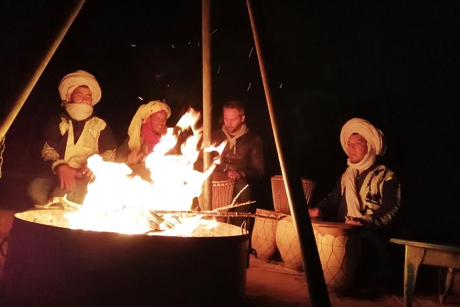 4 days Morocco Sahara Tour - Merzouga at sunset: camp life, camel time, and a fire-side show