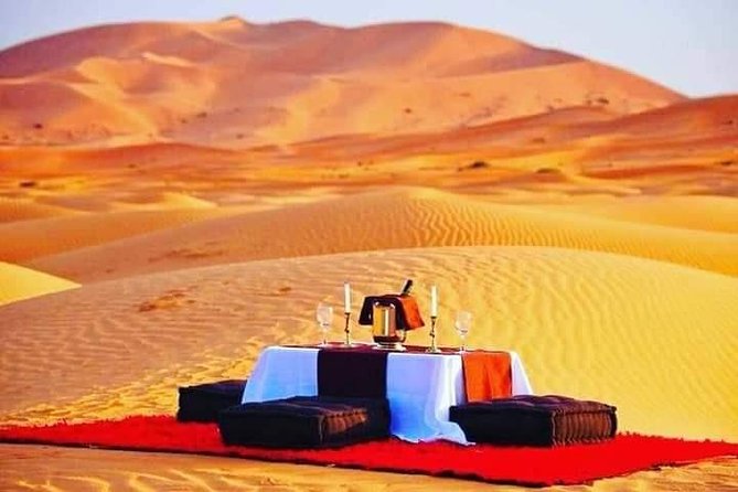 8 Luxury Days Tour Fez to Marrakech via Desert with Transfers airport - Day 4: Merzouga dunes by 4x4, fossil rocks, Gnawa sounds, and camel sunset