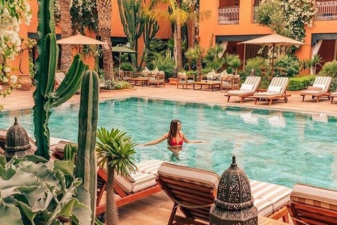 8 Luxury Days Tour Fez to Marrakech via Desert with Transfers airport - Day 6: Kalaa M’gouna roses stop, Skoura palm scenery, and Ouarzazate film-studio sights