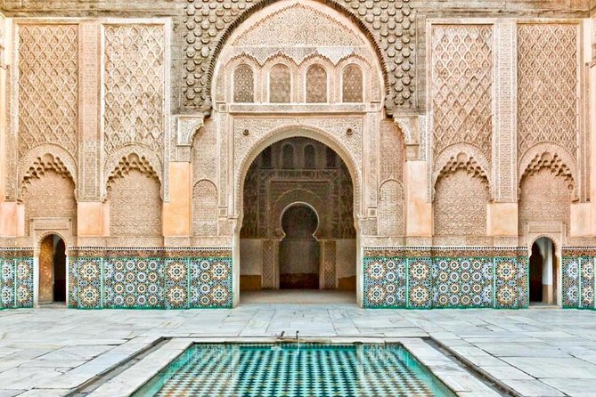 Activity: Half Day Guide Sightseeing City Tour of Marrakech - A Quick Reality Check: Guides, Music, and That Extra Little Spark