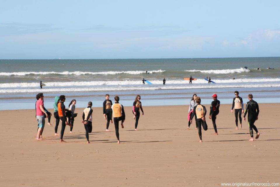 Agadir: Taghazout Beach Surf Lesson with Lunch and Transfer - Coaching in the water: how beginners actually start catching waves