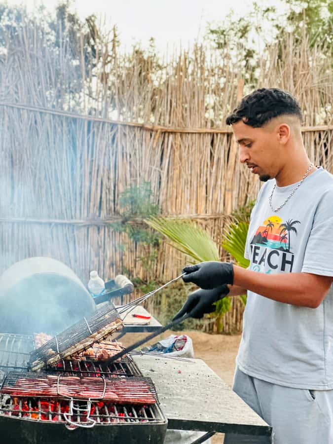 Agadir/Taghazout : Sandboarding & Sunset Camel Ride with BBQ - Tamri ranch BBQ: grilled meats, mint tea, and options