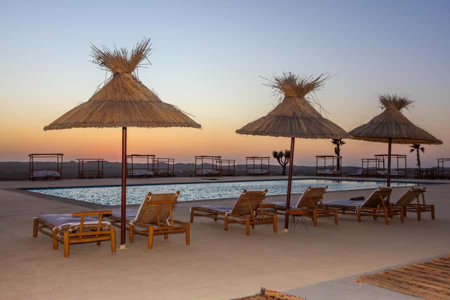 Agafay Desert Luxury Package Quad, Camel, Pool & Dinner Show - Camel ride in a Touareg blue dress: photos, patience, and dust