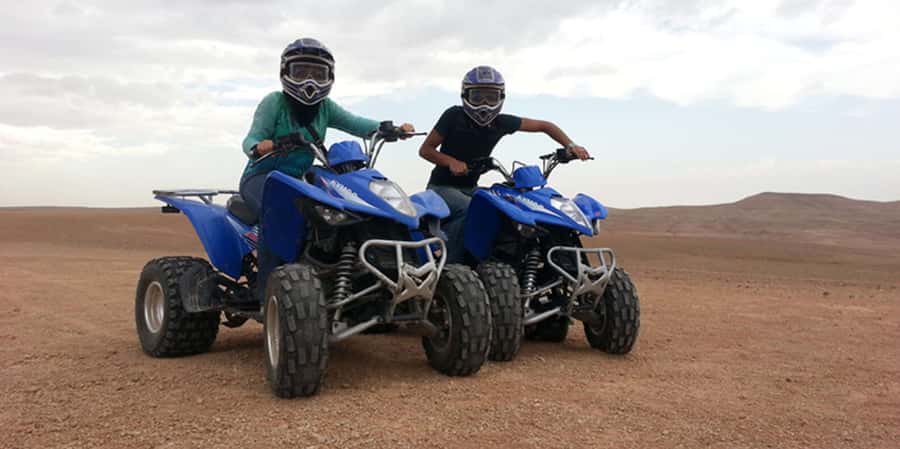 Agafay Desert Quad Biking - The view payoff: Atlas Mountains in the background of dry, dramatic terrain