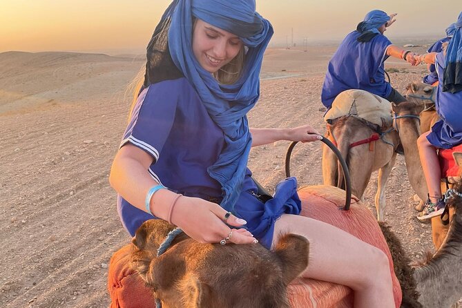 Agafay desert sunset camel ride Tour from Marrakech - Haima Tea, Moroccan Mint, and Live Entertainment After Dark