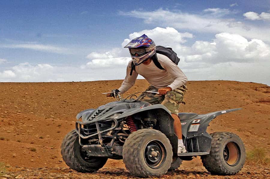 Agafay: Half-Day Rocky Desert Quad & Camel Ride with Lunch - Marrakech pickup and meeting your guides