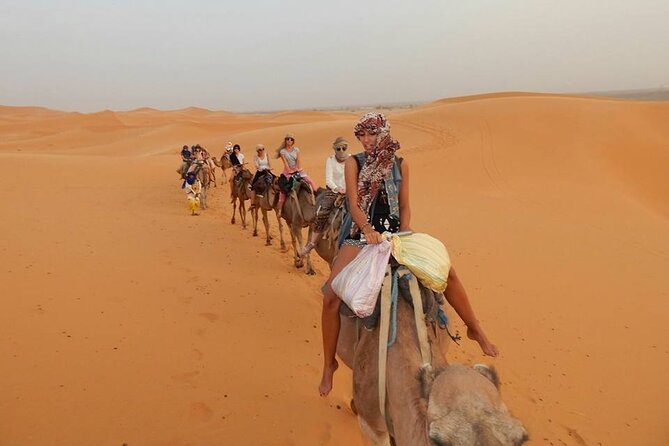Camel trek with 1 Night in Luxury camp with Dinner+ Sundbording - Merzouga start: pickup and the first 90 minutes on camels