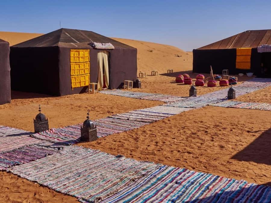 Camp Overnight in Merzouga's Erg Chebbi Dunes from Merzouga - Berber mint tea, camp dinner, and the timing reality check