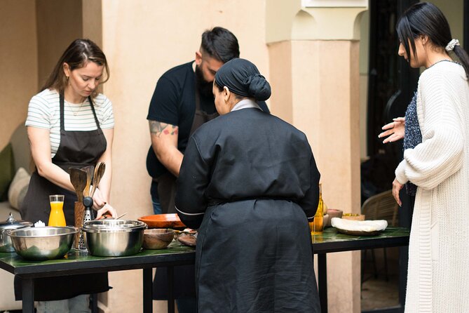 Cooking Course with Lunch & Pool Access in Day Pass - The old souk market walk: where your ingredients start making sense