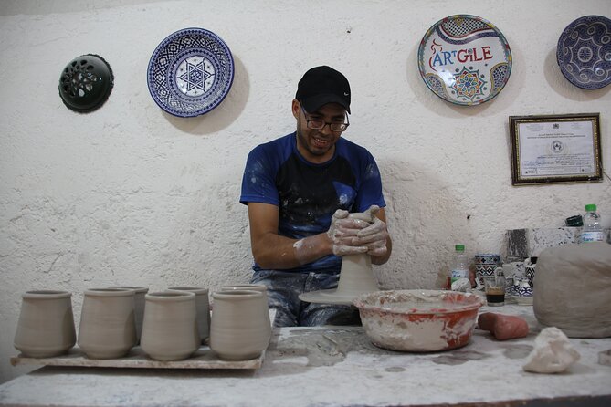 Discover Pottery and Mosaic Zellige on a Factory Tour in Fes - The pottery experience: using your hands on a manual wheel
