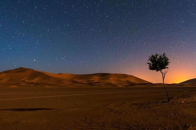 Enjoy Luxury camp 1 nights .camel Drums sandboarding.QUADS - Tajine dinner, mint tea, and Berber music: what camp life adds