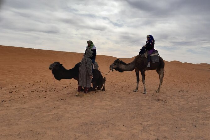 Erg Chebbi camp Merzouga - Sandboarding, dinner, and Berber drums around the fire
