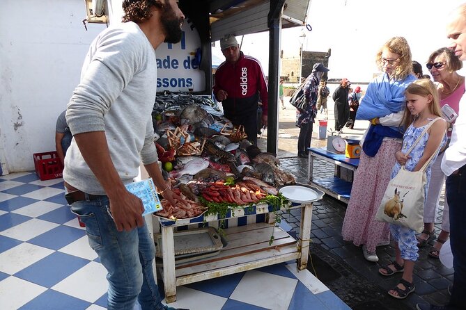 Essaouira The Small Fishing Harbor - Port area and beach time: blue boats, fish stalls, and sea air