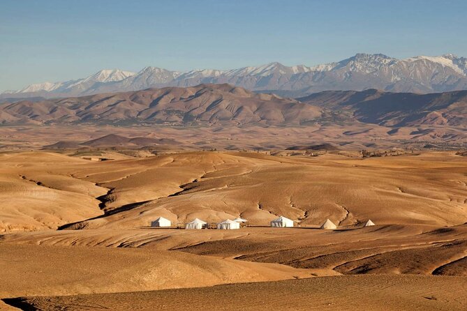 Experience the Magic of Agafay Desert: Quad Biking,Camel & Dinner - Getting There: 4 PM Start, Air-Conditioned Pickup, and a Set Return Time