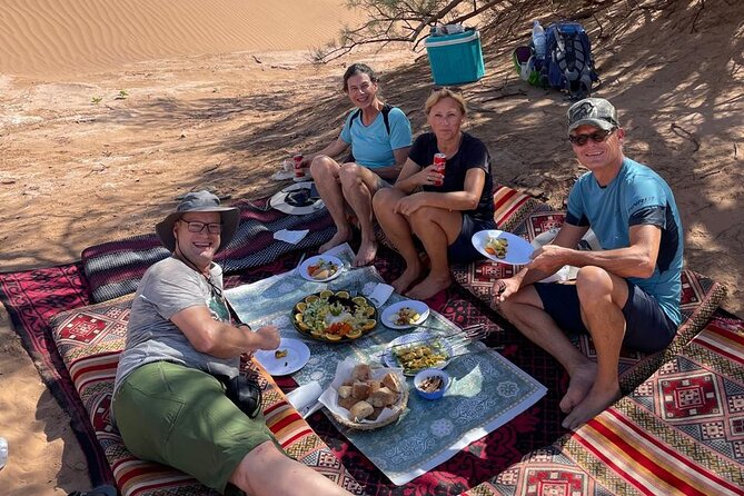 Experience the real Sahara desert with local expert in 2 days - Day 1: camel sunrise, oasis edge lunch, and a bread-baking camp night