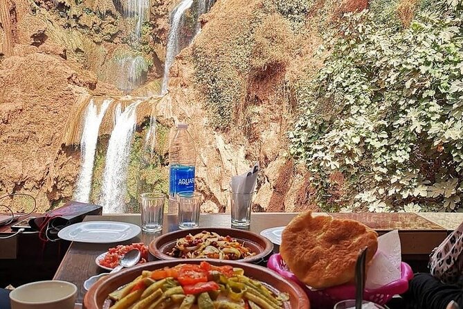 Explore Ouzoud waterfalls Marrakech Guided Hike & Boat Experience - Lunch in front of the falls: how to make the food stop work for you