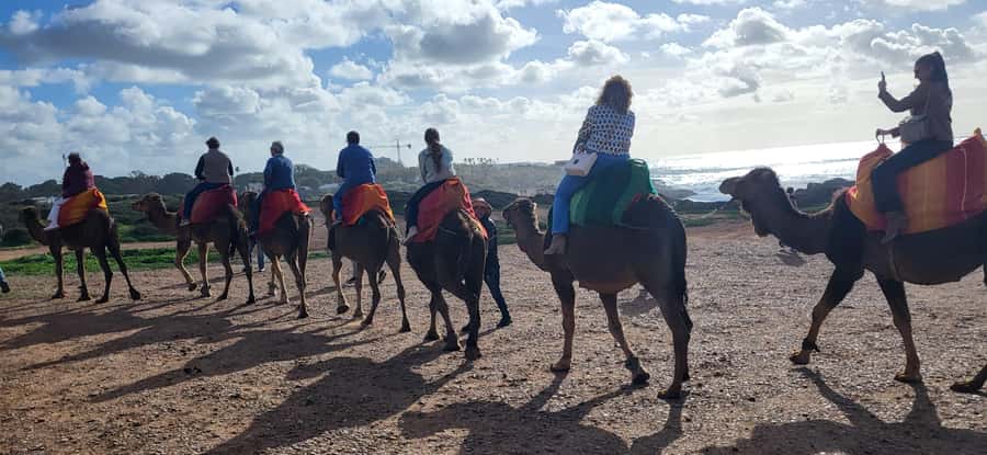 Explore Tangier: Cap Spartel, Cave, & Camel Ride Adventure - Hercules Cave: legendary formations, queues, and a real-world ticket note