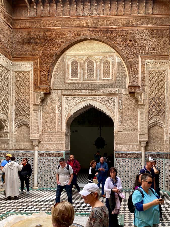Fes: Attarine Madrasa, Museum, Tannery, Souk and Medina Tour - Souks and the Medina maze: textiles, spices, and metalwork rhythm