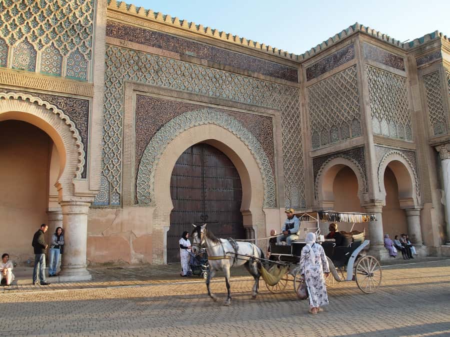 Fes: Day Trip to Meknes Volubilis and Moulay Idriss PRIVATE - Bab El Mansour and the zellige that makes Meknes pop