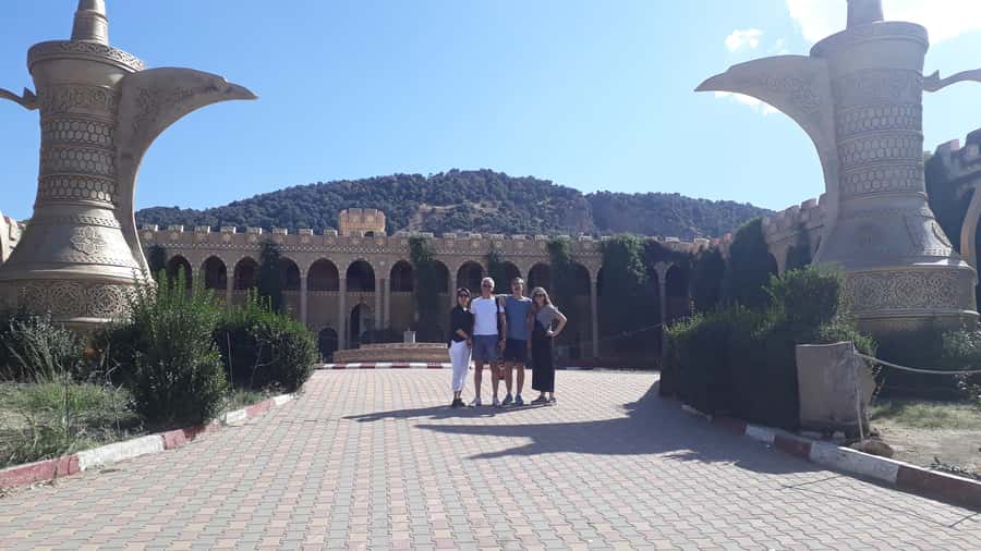 Fes to Middle Atlas Mounains Berber Villages caves Day Trip - Ifrane’s French Architecture: Flower-Lined Alleys and a Quiz-Ready Town