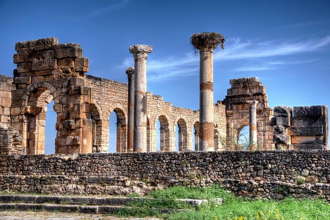 Fes to volubilis day trip - Meknes feels like Morocco’s Versailles: Bab Mansour, walls, and Place Hedim