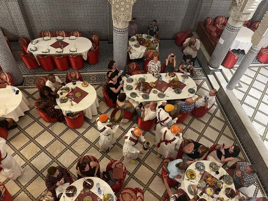 Fes : Unforgettable Dinner Show Experience with hotel pickup - Restaurant atmosphere: textiles, setting, and comfort