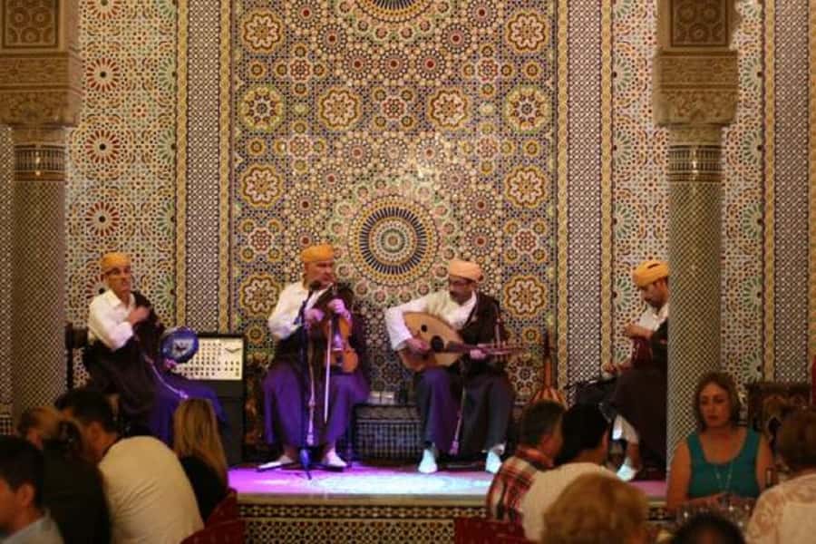Fes : Unforgettable Dinner Show Experience with hotel pickup - The Moroccan meal: salads, tajine, and a sweet finish