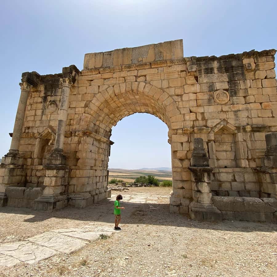 Fes: Volubilis Roman Ruins, Mouly Idriss, & Meknes Day Trip - Moulay Idriss: Green-Tiled Roofs, Hill Views, and Sacred Streets