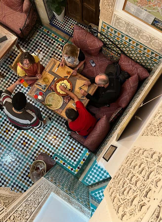Fez: Souk Tour and Traditional Home Cooking Class - Entering Dar Sunrise: tea, choice, and a real kitchen vibe