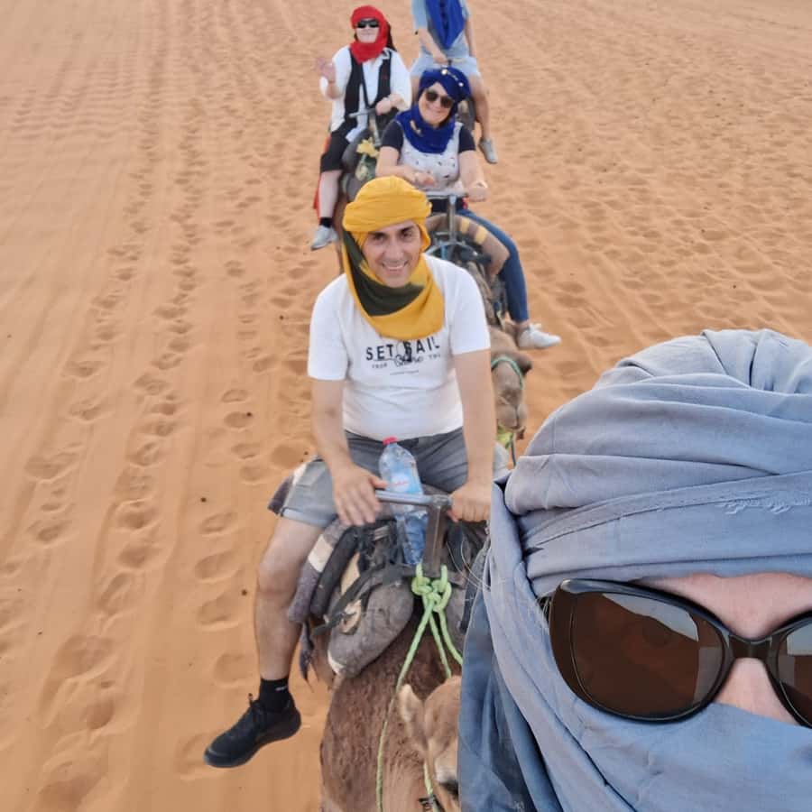 From Fes: 2 Day Round Trip Via Merzouga Desert & Camel Trek - Midelt, lunch time, and the Ziz Valley shift toward desert country