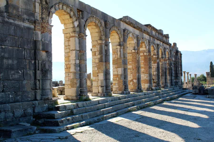 From Fez: Volubilis Moulay Idriss and Meknes Day Trip - Volubilis Roman ruins: walking distance to the Arch of Caracalla