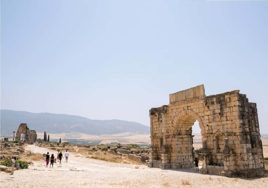 From Fez: Volubilis, Moulay Idriss and Meknes Full Day Tour - The ride out of Fez: photo stops, Achahad, and a cool-air break