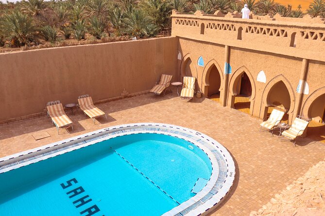From Marrakech : 2 Day Stay in Merzouga with Food and Camel Trek - Day 2: Pool time, Erg Chebbi sunset camel trek, and camp dinner with a Berber show