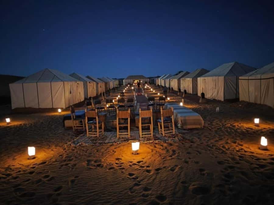 From Marrakech: 3-Day Sahara Desert Adventure to Fes - Erg Chebbi Day: Sunset Camel Ride, Sandboarding, and Merzouga Magic