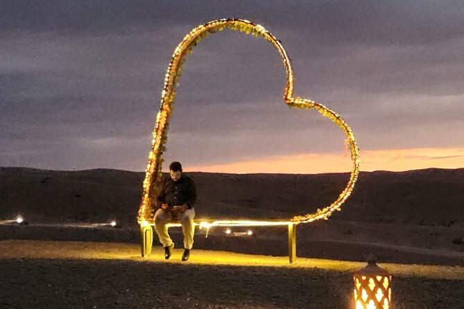 From Marrakech: Agafay Desert Camel Ride experience Dinner show - Dinner, Traditional Music, and the Fire Show: The Part People Remember