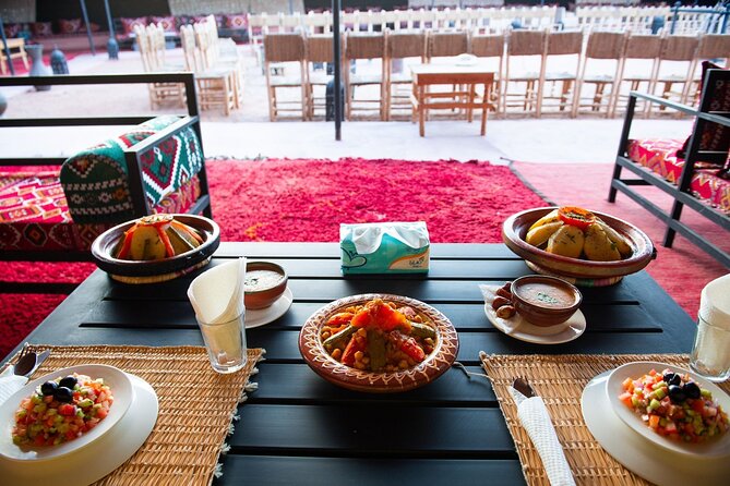 From Marrakech: Agafay Desert Camel Ride experience Dinner show - Sunset and the Agafay Camp: Where the Evening Changes Gear