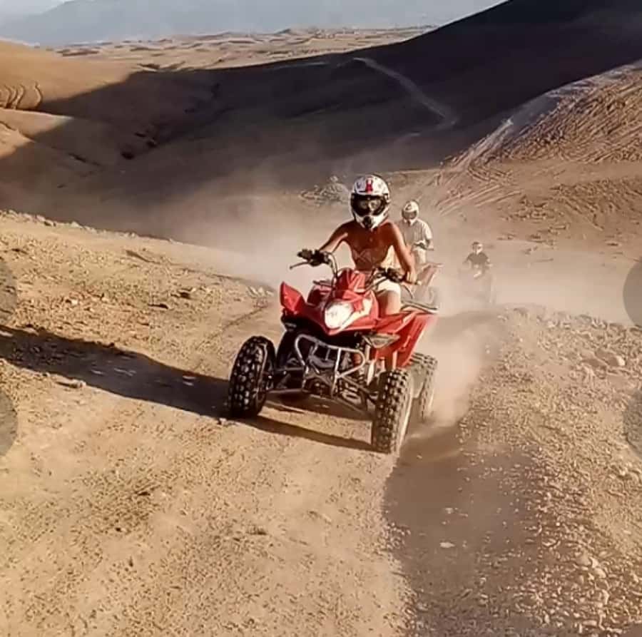 From Marrakech: Agafay Desert Quad Biking Tour with Transfer - Helmet up: safety briefing and how the guide keeps the ride smooth