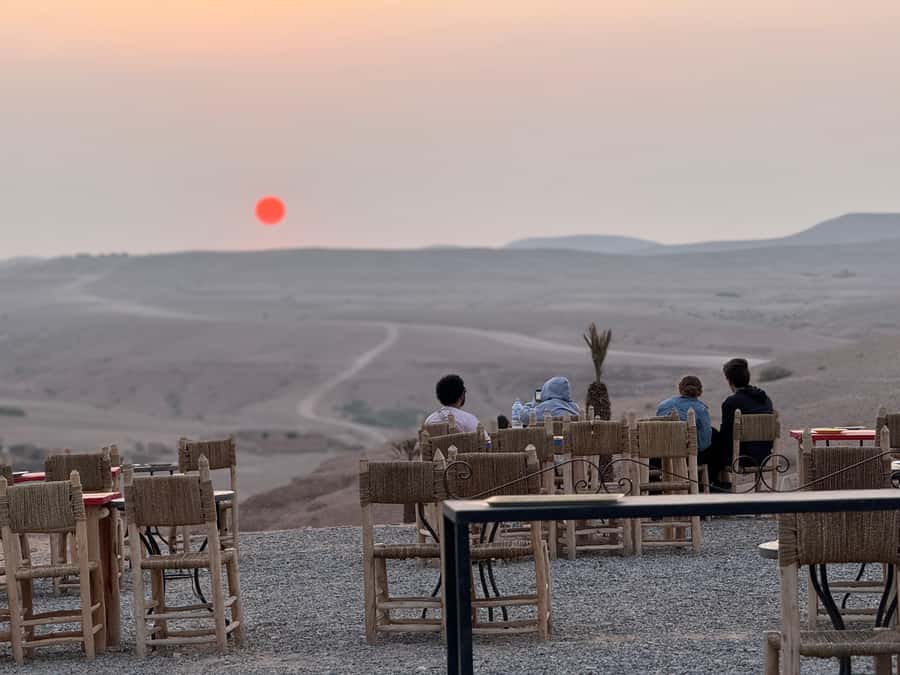 From Marrakech: Agafay Sunset Camel Tour with Dinner & Show - Two Berber Music Groups and a Cirque-Style Show