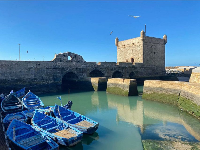 From Marrakech: Essaouira Day Trip with Hotel Pickup - Mogador Beach Stretch: Wind, Kitesurfers, and a Different Pace