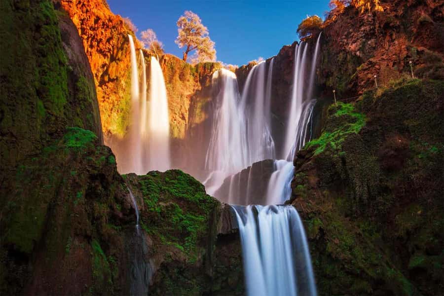 From Marrakech: Private Ouzoud Falls & Boat Ride Day Trip - The waterfalls up close: 110m tiers, mist, and photo angles