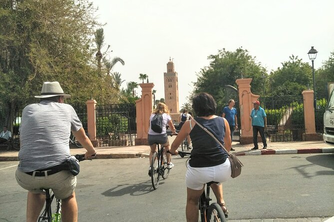 Half-Day Highlights of Marrakesh Bike Tour - Menara Gardens and the pavilion view: classic Marrakech, measured pace