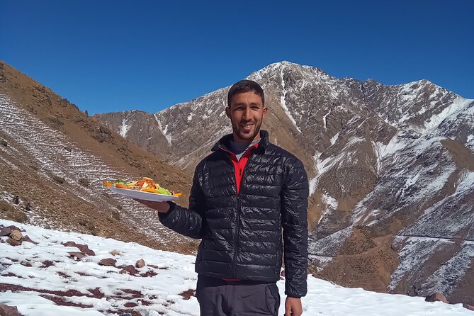 Hiking and summiting the Atlas Mountains day trip from Marrakech - Lunch break with a Berber family: food, tea, and rooftop views