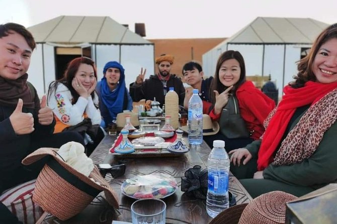 LUXURY Desert Camp: 3 Days Marrakech to Merzouga and Camel Trek - Riding Into Merzouga: Sunset Camels Are the Magic Button