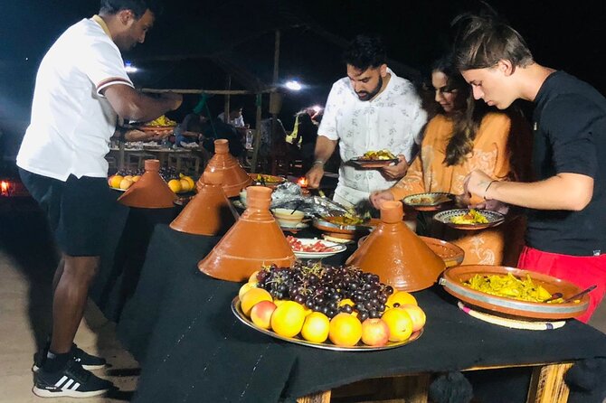 Magical Evening in the Agafay Desert: Dinner, Shows & Adventures - Dinner under the stars: tagines, couscous, and mint tea