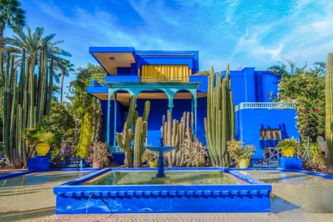Majorelle Garden, St Laurent and Berber Museum Round Trip Ticket - Stop 1: Jardin Majorelle’s cobalt-blue architecture and botanical calm