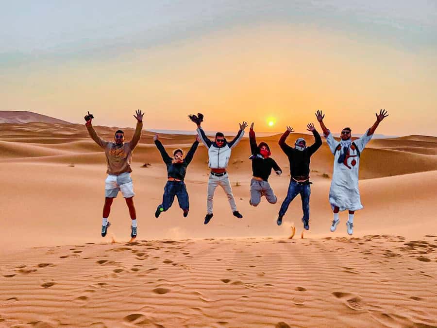 Marrakech: 3-Day Trip to Fez with Sandboarding & Camel Ride - Merzouga dunes: camel rides at sunset, sandboarding, camp life