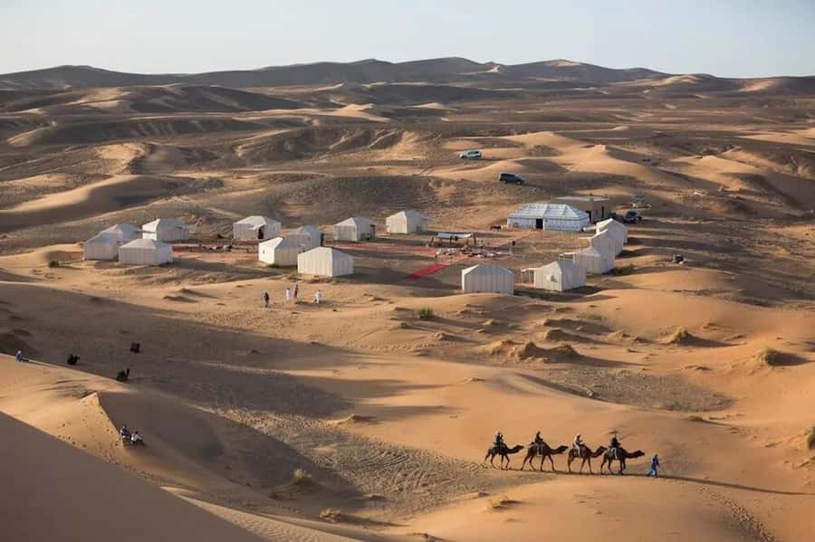 Marrakech: 4-Days Luxury Desert Tour to Fes via Merzouga - Merzouga at dawn: sunrise, Berber breakfast, and a longer desert day
