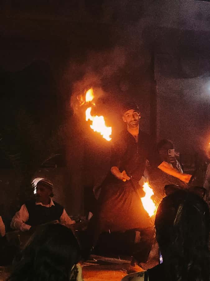 Marrakech: Agafay Camel Ride & Dinner with Fire Show Tour - Moroccan dinner, live music, and the pace of the group night