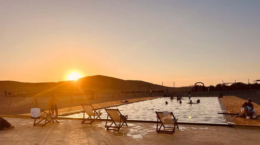 Marrakech: Agafay Desert Camel Ride, Dinner, Fire Show - Desert Pool Time: A Refreshing Stop That’s Seasonal